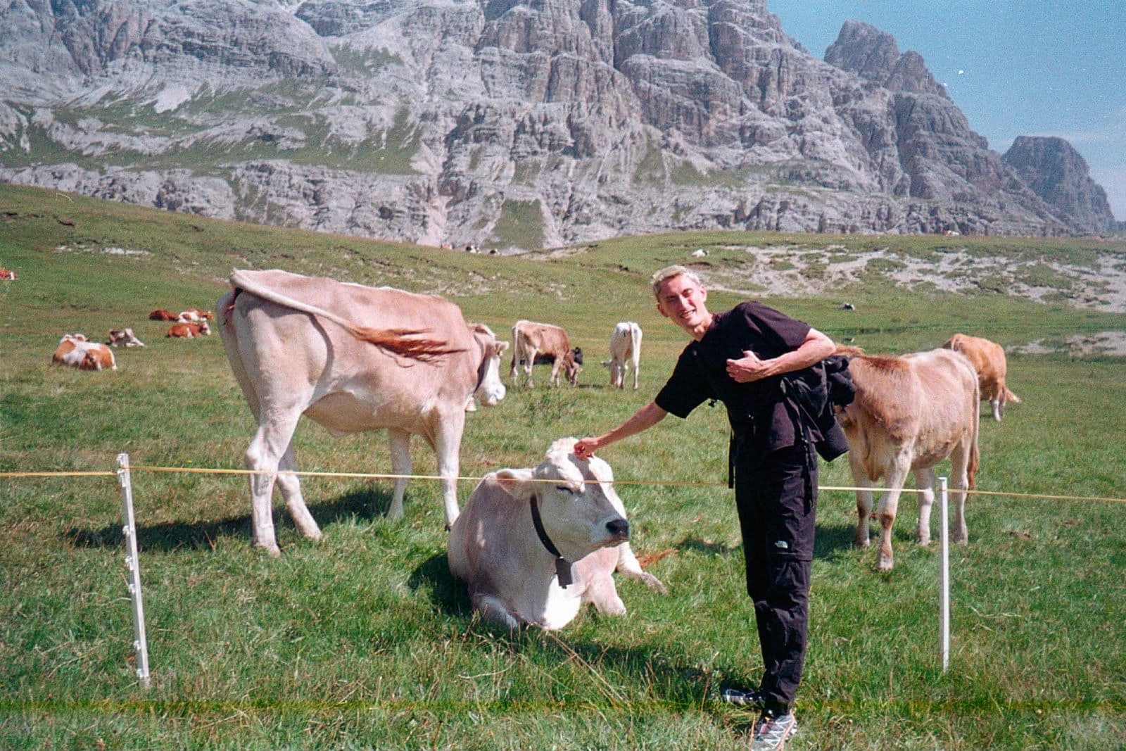 Augustijn in the mountains with cows